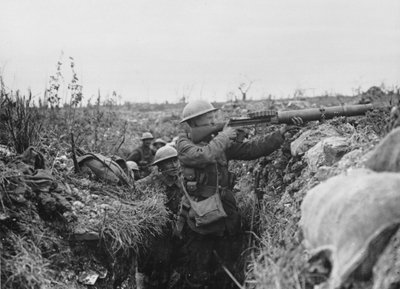 Lewis gunner on the firing step of a trench, 1916-18 by English Photographer